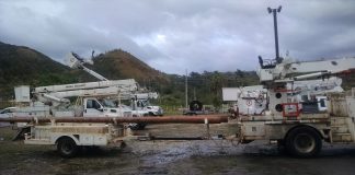 Electric bucket trucks for electric grid repair n Puerto Rico